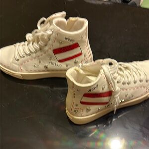 Women's size 8.  White and Red High-Top Sneakers